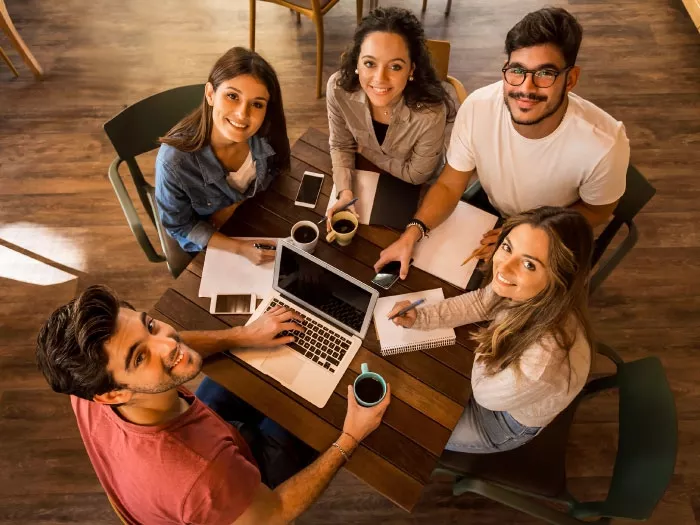 5 Students studying in a coffee shop