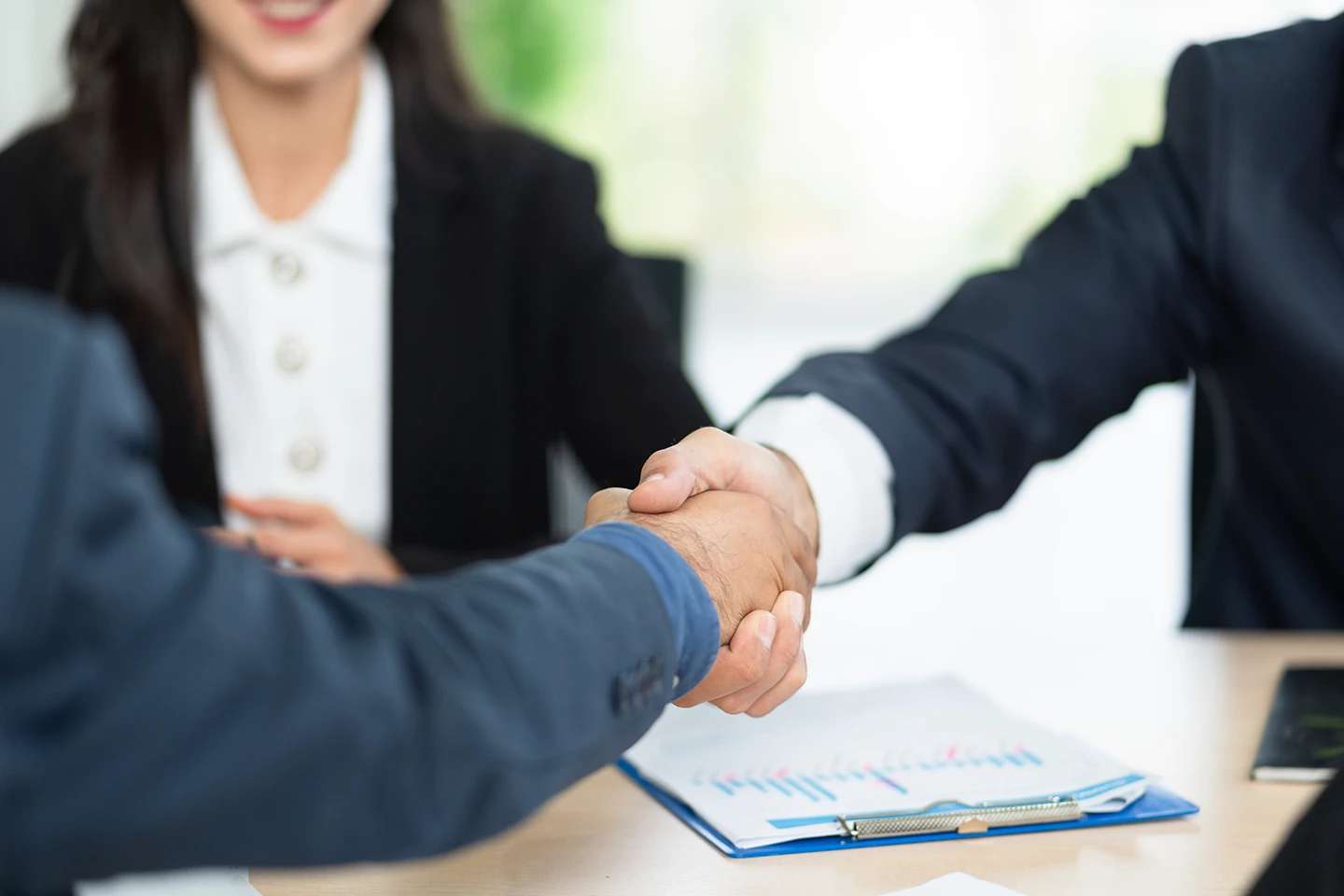 CFA® Ethical and Professional Standards - candidates shaking hands