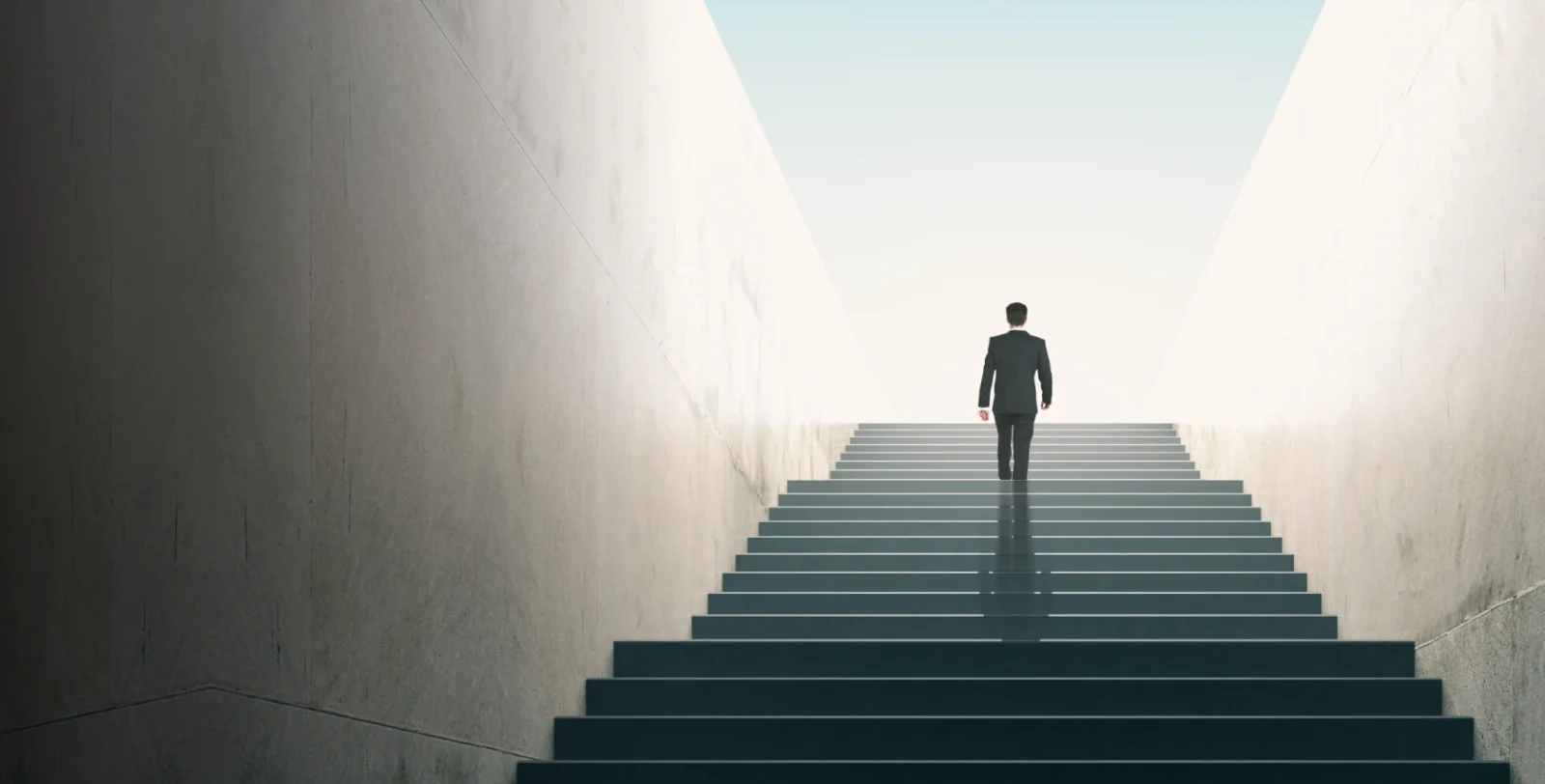 CFA Candidate being represented as starting to climb the stairs up in the journey towards the CFA charter.