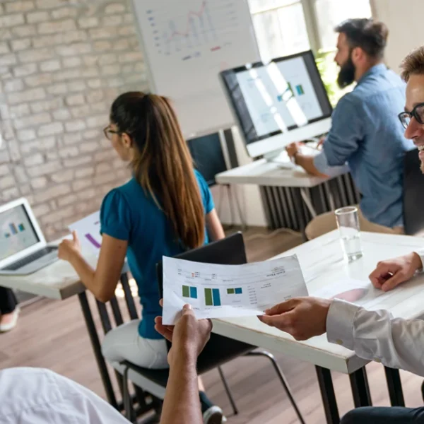 Group of professionals from non-finance backgrounds in a CFA prep classroom