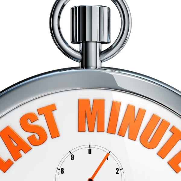 A stopwatch with 'LAST MINUTE' in bold orange letters, representing a CFA candidate's final countdown and urgency during last-minute exam preparation.